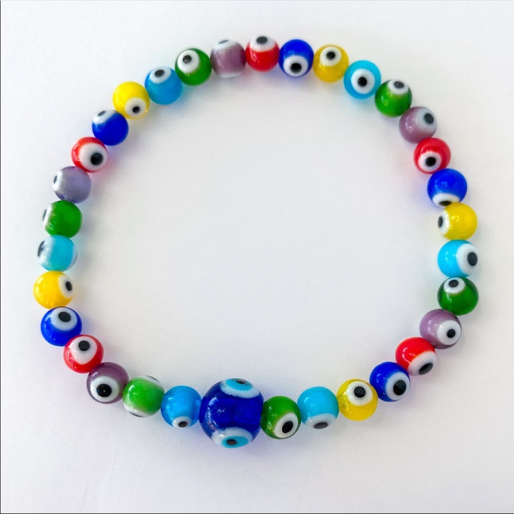 Lamp work evil eyes handmade bracelet.  One size